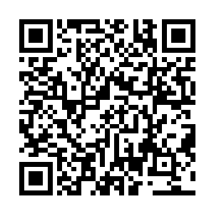 似是未雕琢完善的塑像――只这样一座山体石像沉厚万吨二维码生成