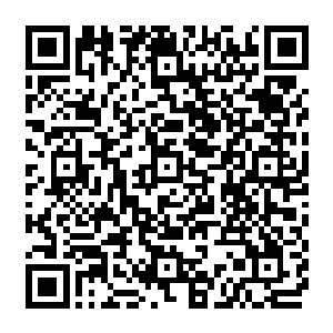 做出这种装扮还穿着这种长筒布靴的女人要么是刚刚从古代穿越回来要么正准备穿越到古代二维码生成