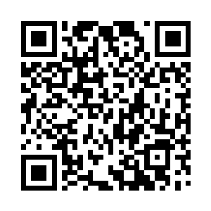 几架型号老旧的武装直升机依次排列……二维码生成