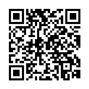 卓景坐在办公桌后正面无表情的看着我二维码生成