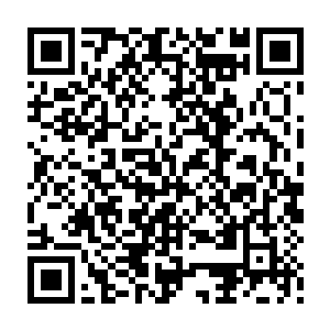 周里街上已经建成的建筑物上全部贴上了庆祝周里乡党代会胜利召开的标语二维码生成