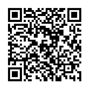 在县广播电视局的旁边有一个卖农用小型拖拉机的门市二维码生成