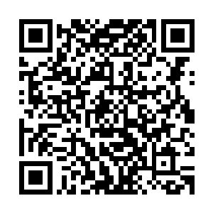 张铁看到了一个他离开时还没有的十多米高的竖起来的钢铁支架二维码生成