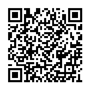 当他们冲进教室看到张启涛倒在了讲台上的时候二维码生成