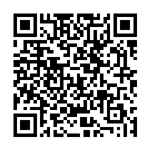 或许开枪的人是在目力不可及的极远处进行射击的二维码生成