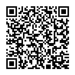 灯光之下小金人的淡淡光芒在尼古拉斯的瞳孔里迸发出了万丈光芒二维码生成