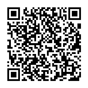 然后从别克凯越的行李架和后备箱中取出了七辆折叠式山地自行车二维码生成