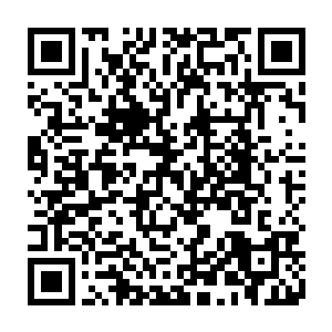紧跟在他后面一起走进安全门的话……那就会立刻触动安全门的警报装置二维码生成