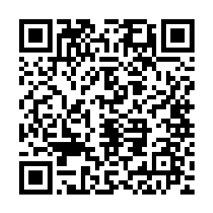 车载的重型机枪已经向最先冲击上了的恐怖分子展开了压制射击二维码生成