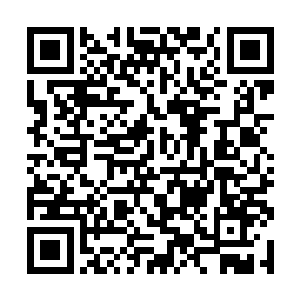 这口小锅看上去就如普通人家炒菜用的炒锅一般模样二维码生成