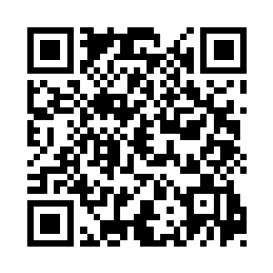 里面摆着满满的一院子的二手摩托车和自行车二维码生成