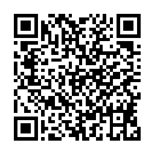 陆为民是在回中午返回丰州的路上接到省委组织部的电话的二维码生成